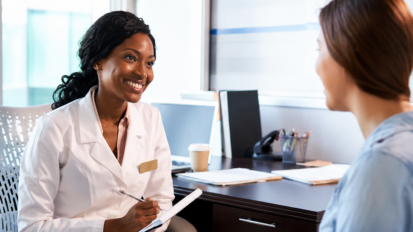 Healthy Aging Doesn'T Have To Be Complicated: 6 Simple Habits That Actually Work 7 Smiling Female Doctor In A White Coat Taking Notes While Speaking With A Patient In A Bright, Modern Medical Office.
