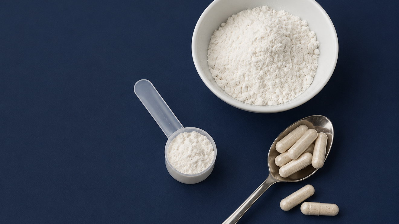 10 Foods To Eat More Often To Support Healthy Aging 11 White Supplement Powder In A Bowl And Scoop Beside Beige Capsules On A Metal Spoon, Arranged On A Navy Blue Surface.